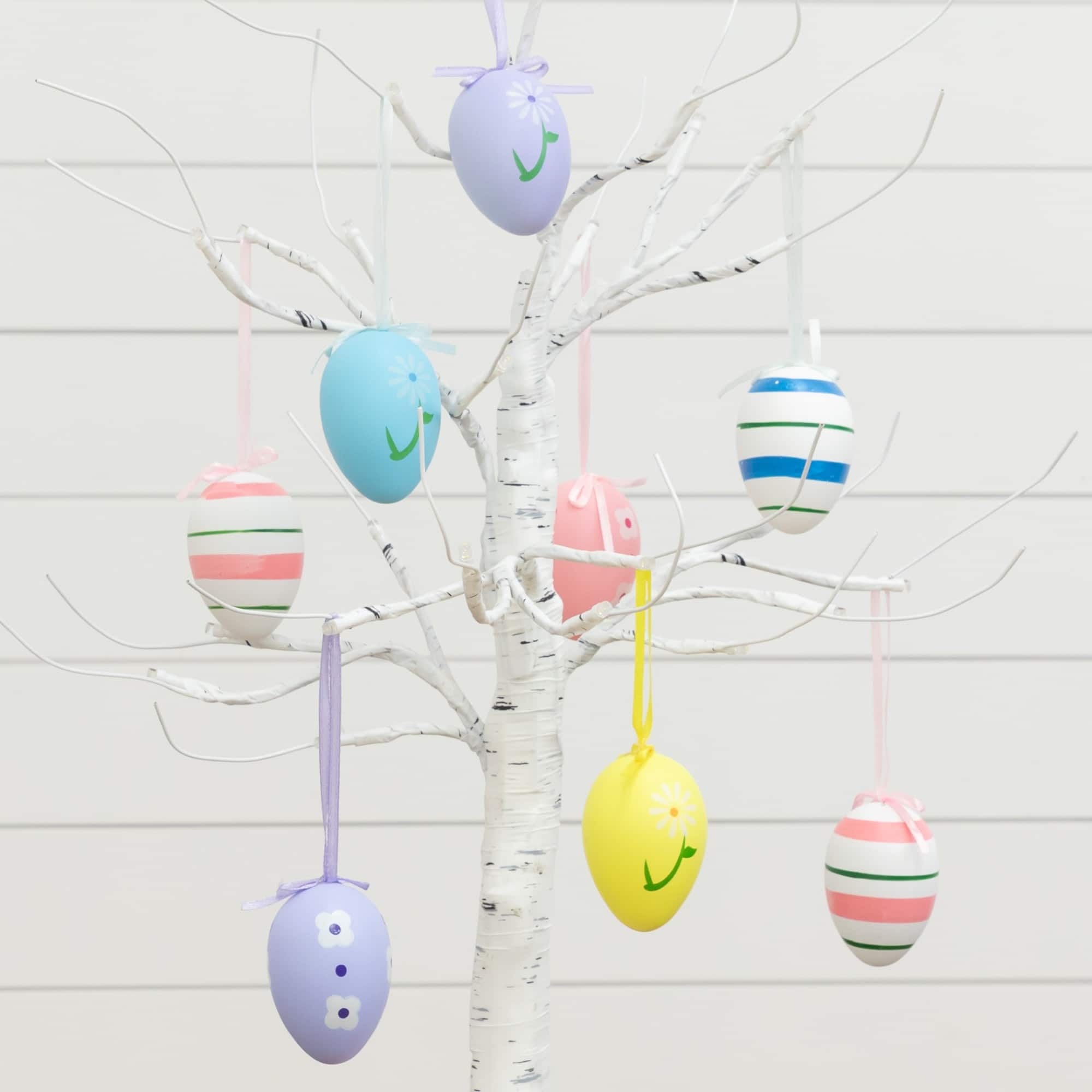 2ft. Pre-Lit Artificial Easter Twig Tree with Egg Ornaments and 24 Warm White LED Lights